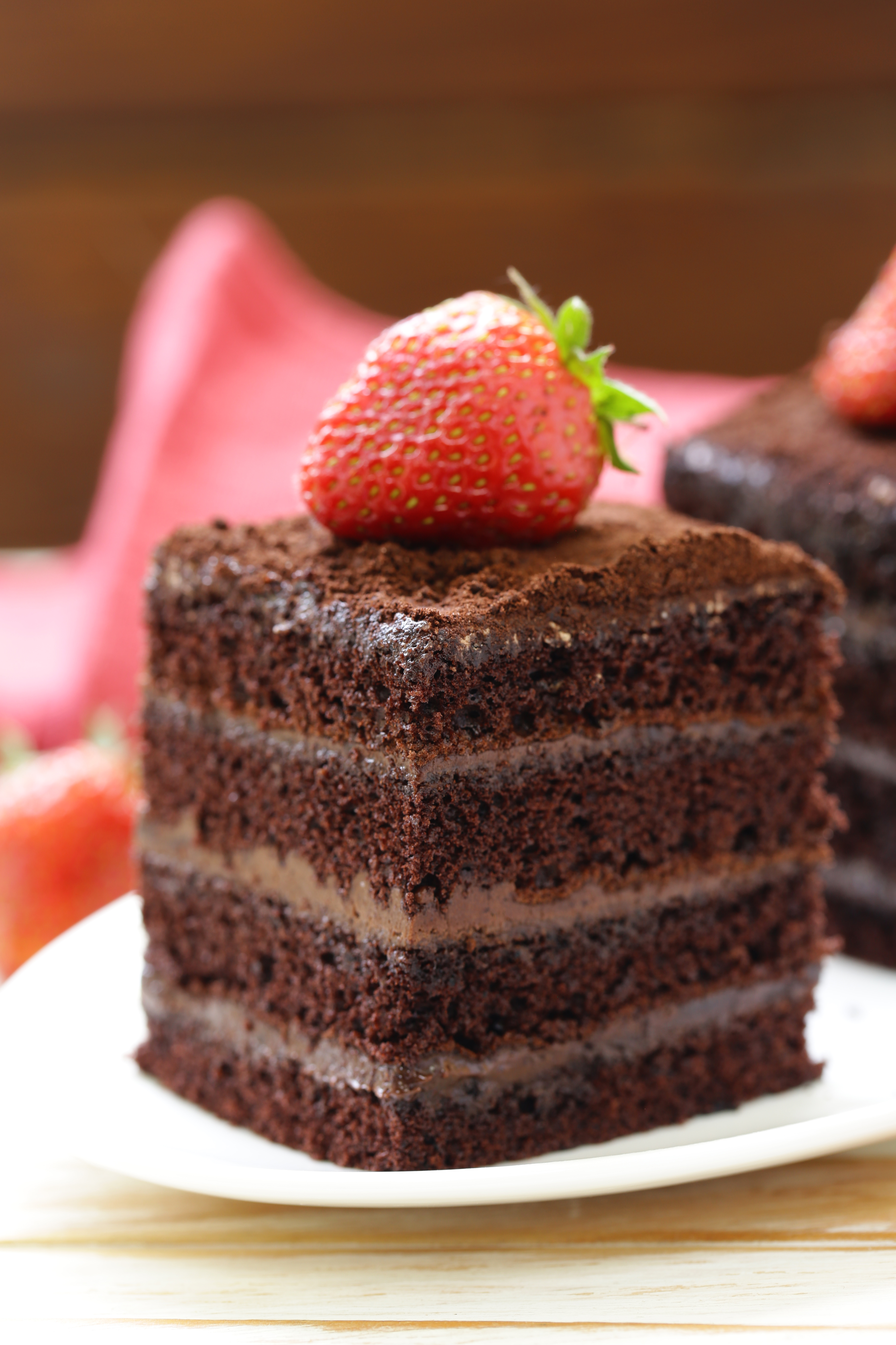 This chocolate cake and cupcake recipe produces a crumb that is moist and fudgy and is so easy to make