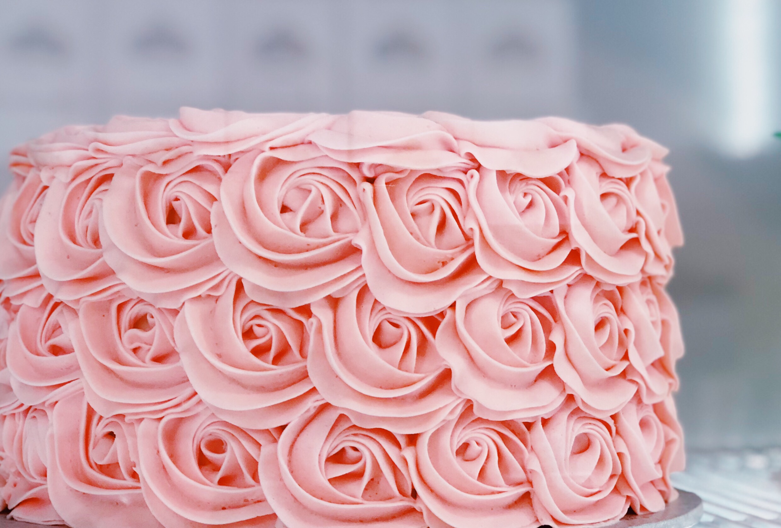 perfect piped rosette cake with magic swiss meringue buttercream frosting by the princess baker perfect for baby showers bridal showers and birthday parties