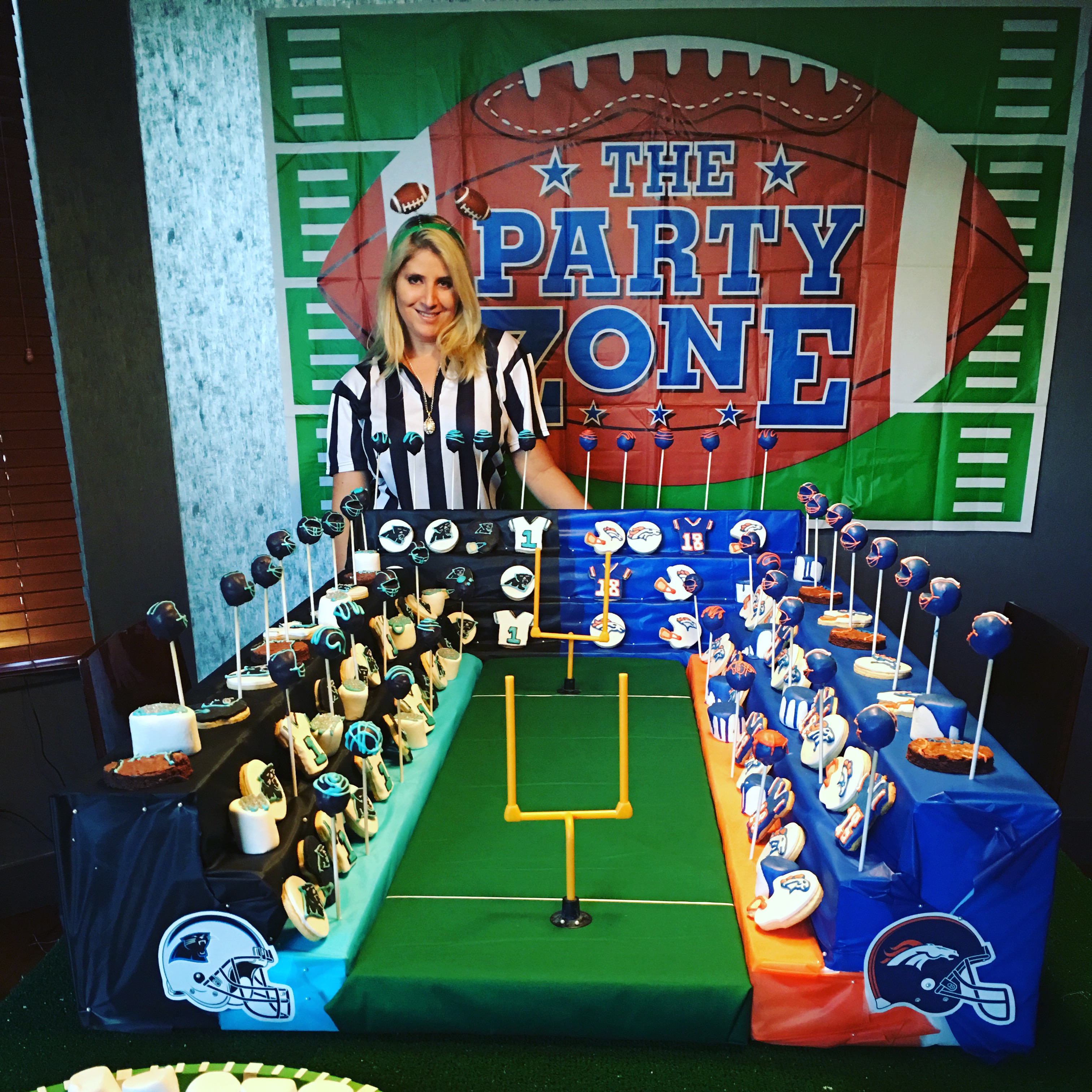super bowl party dessert table stadium football cake pops, decorated sugar cookies, brownies, chocolate covered oreos